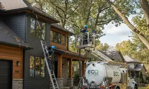 Gutter cleaning for tree-covered lots in Greensboro, NC by vinyl siding professionals